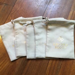 Five Kendra Scott jewelry gift storage pouches